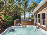 Indulge in ultimate relaxation with your own private hot tub, the perfect spot to unwind and enjoy a peaceful retreat.